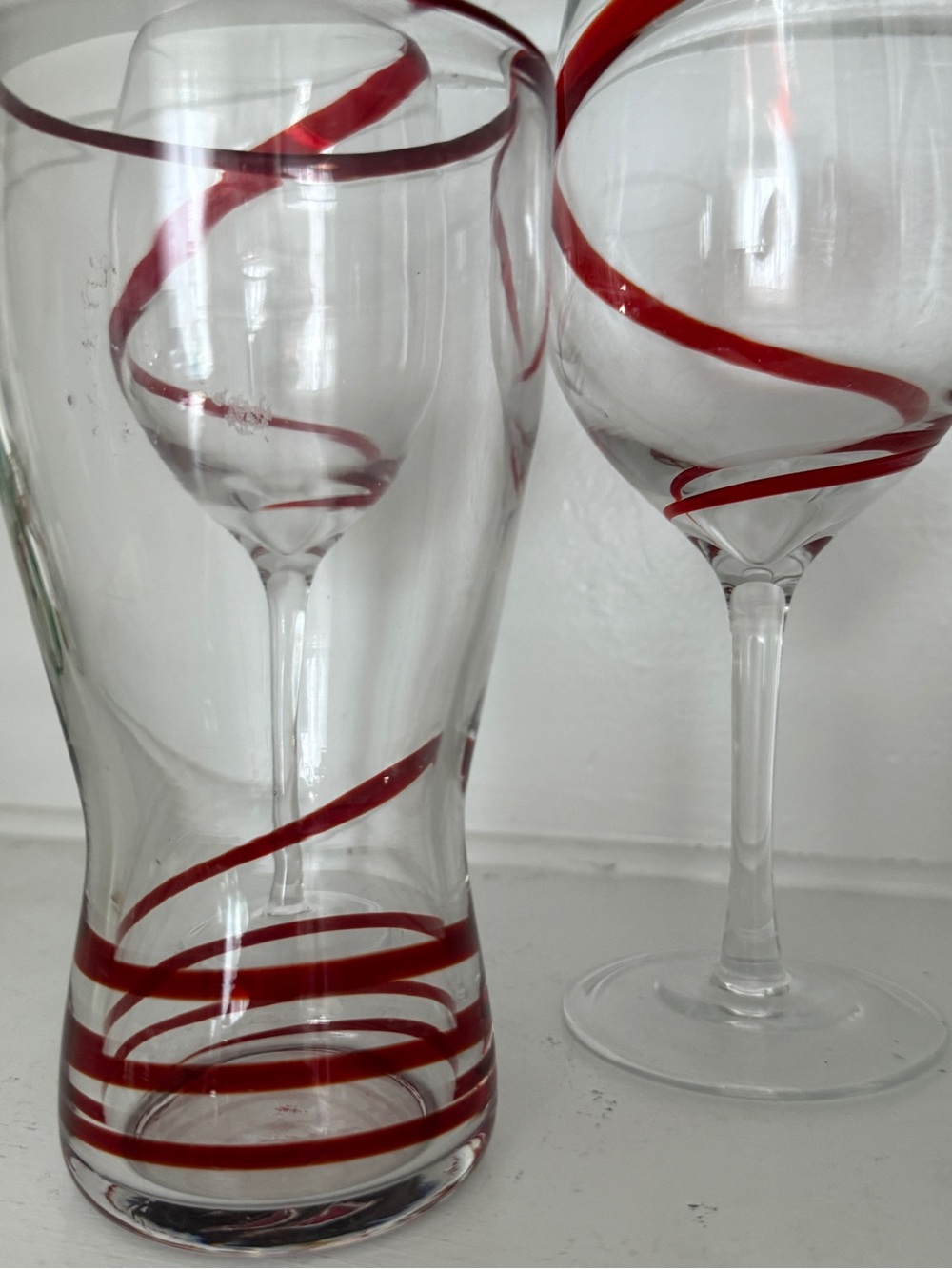 Set of Clear Glasses with Red Spiral Accent